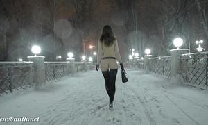 Jeny smith bare in snow fall walking throughout the town