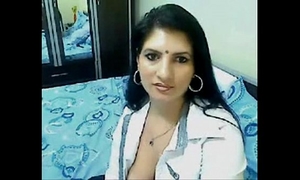 Hot & concupiscent high class bhabhi home alone chatting on web camera